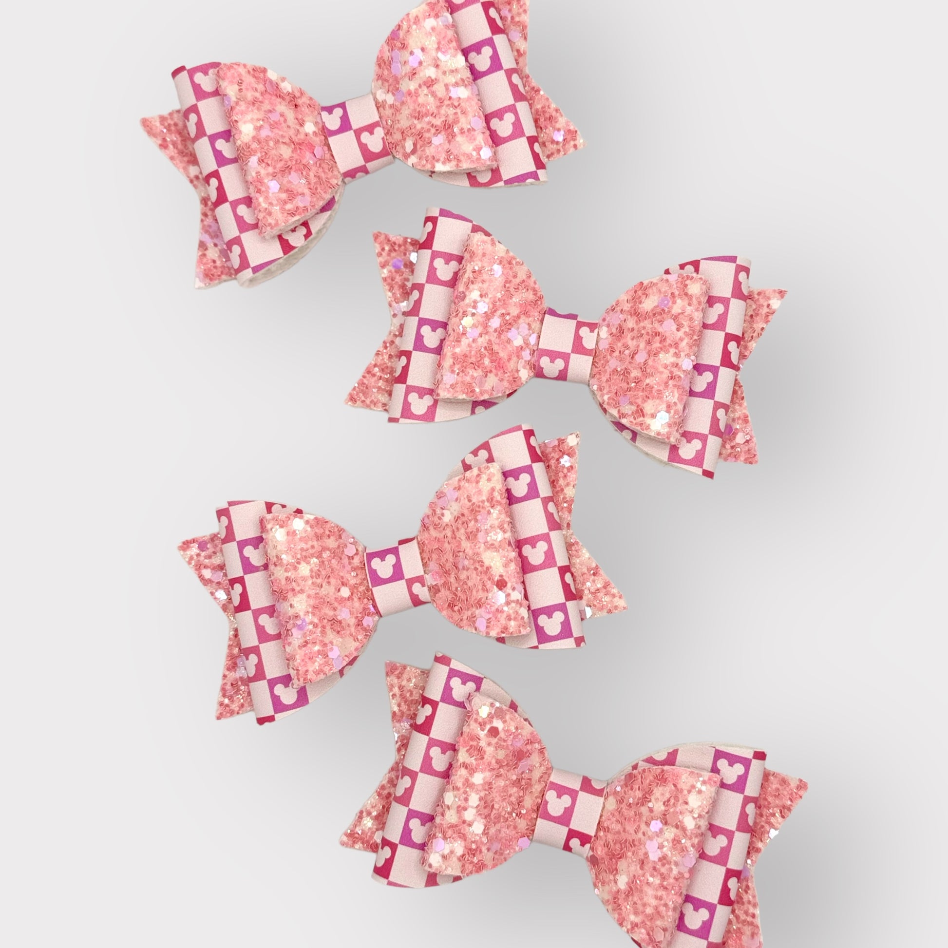 Checkerboard Mouse Heads | Large Stacked Pink Glitter Faux Leather Hair Bow - Nic + Lex Co